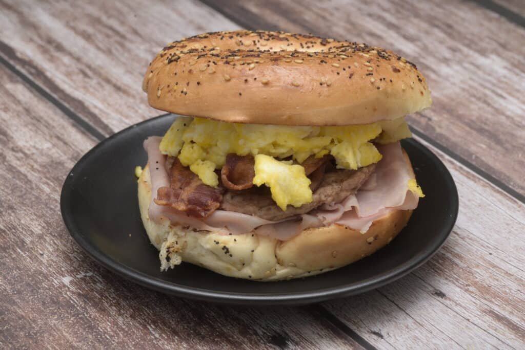 breakfast bagel: egg, bacon, and ham